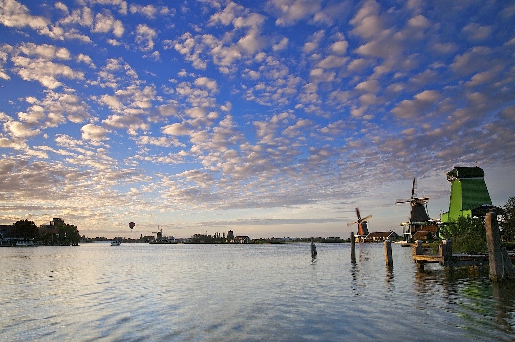 Windmills on the river Zaan at sunset